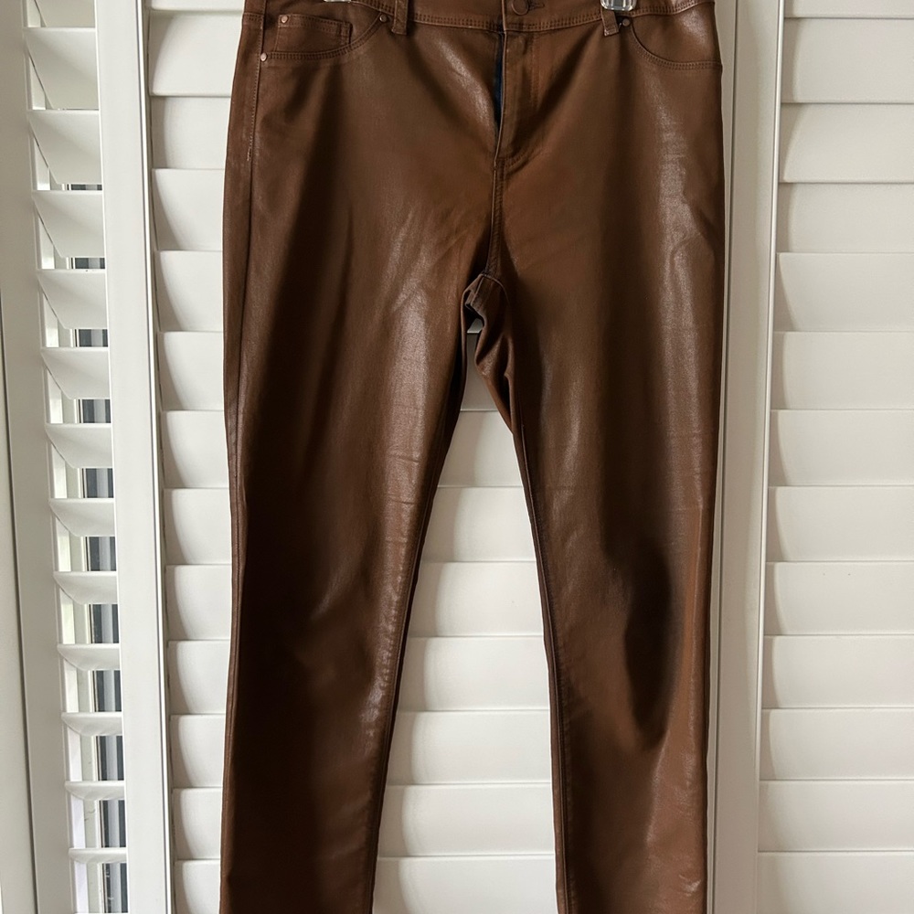 Brown “faux leather “ stretchy jeans from Chico’s Platinum size 1.5 fits 8-10.